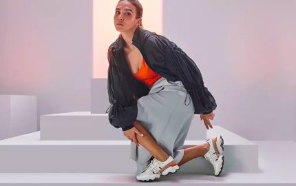 Woman posing in Sorel sneakers